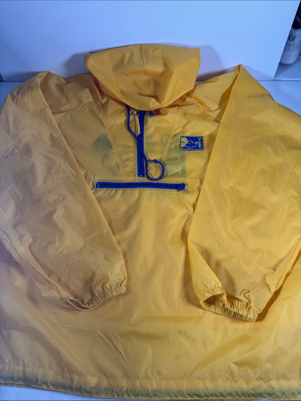 unisex Yellow Hooded Windbreaker Jacket with Blue Zip Detail